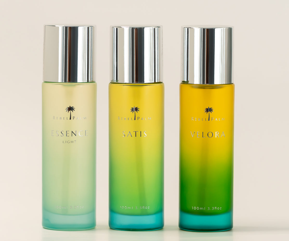 Three bottles of premium skincare by rebel palm