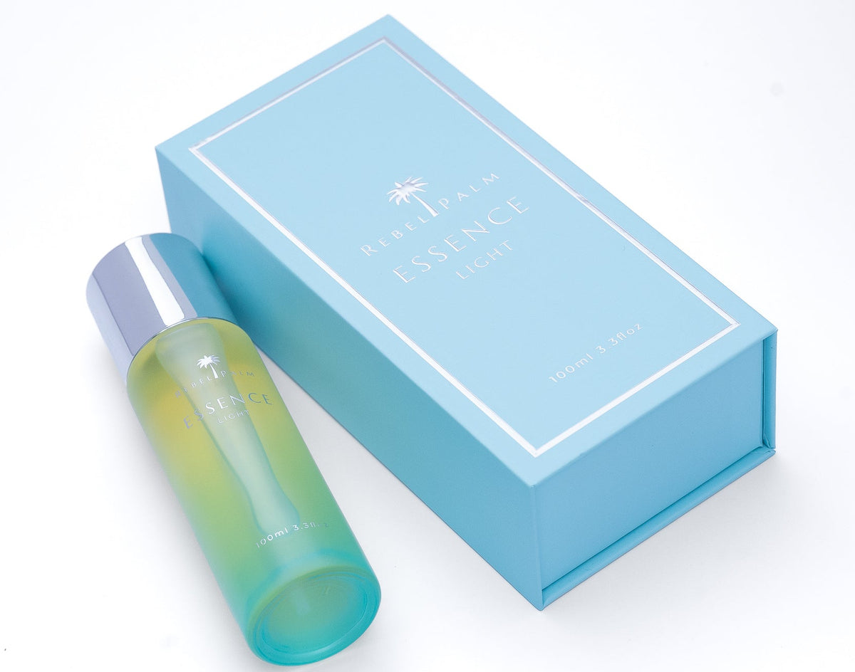 Essence Light lightweight body oil with botanical skincare packaging