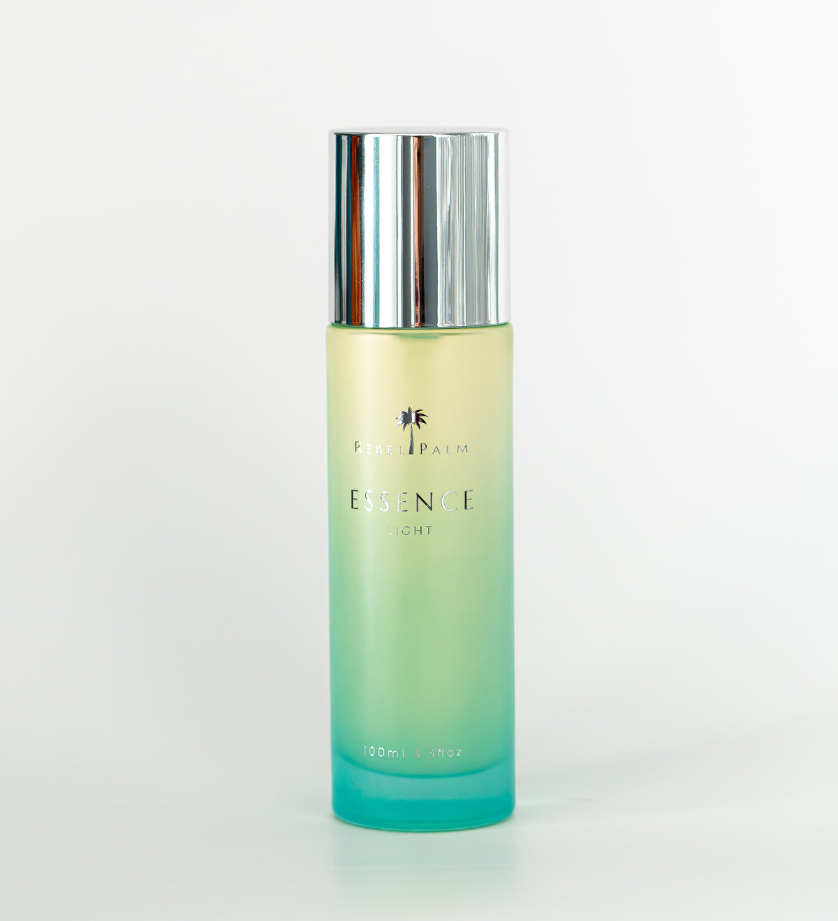 Rebel Palm Essence Light Body Oil – yellow to teal gradient glass bottle with silver cap, 100ml